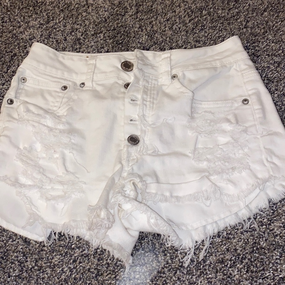 white AE ripped jean shorts